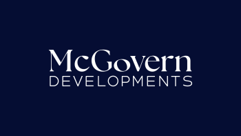mcgovern logo web primary white navy landscape